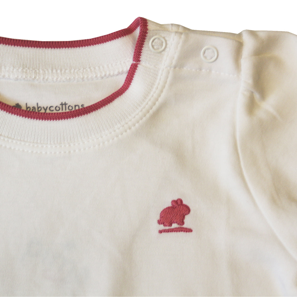 Camiseta Babycottons ML C/vivo Pima Blanco Fucsia